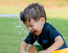 Troy > We did NOT put the hose on Anthony to get this shot. Cousin Franklin was just having fun and had no idea the hose was pointed at Anthony.